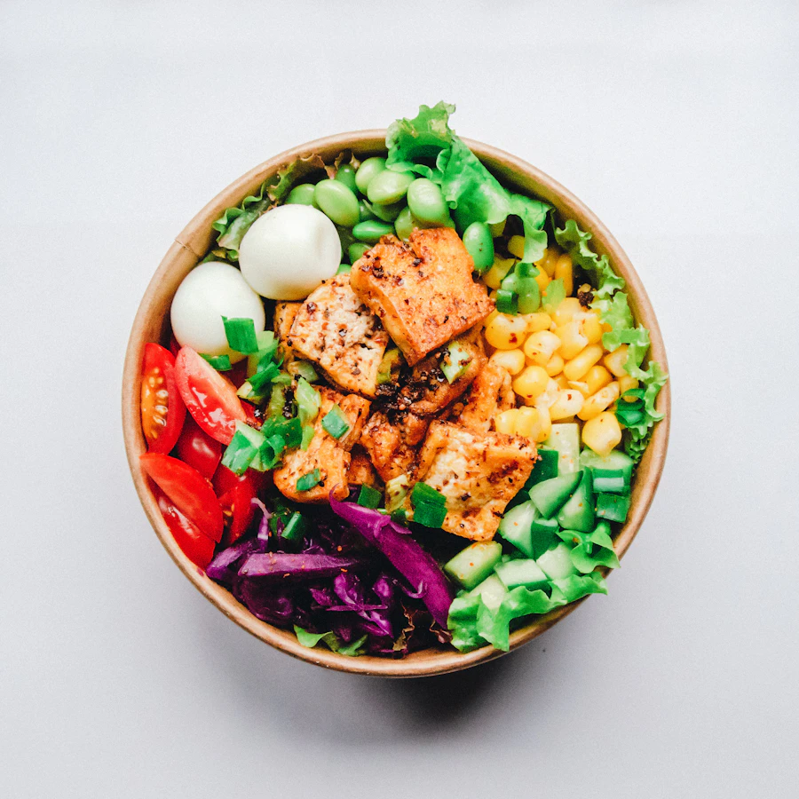 A bowl of colourful seasonal grains and roasted vegetables